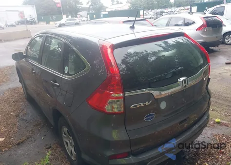 2015 Honda Cr-V Lx z USA, uszkodzony, nr VIN 5J6RM4H37FL048081